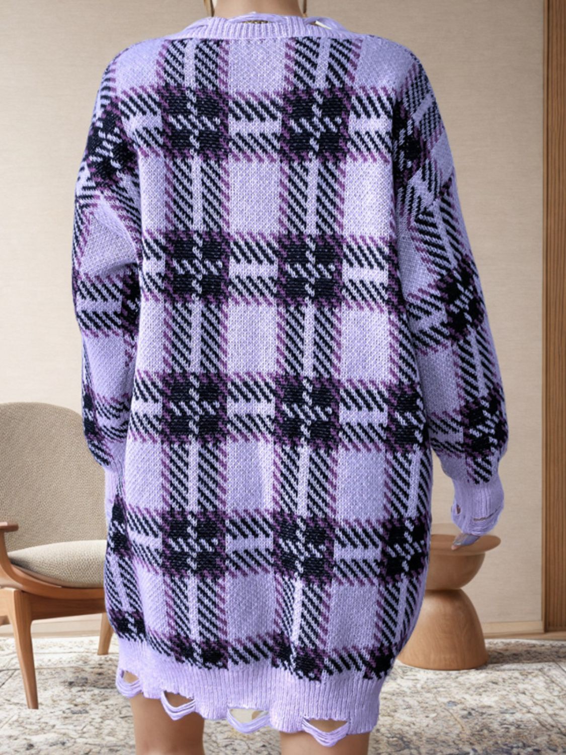 Distressed plaid V-neck long sleeve sweater dress by BELLA BLA featuring a trendy, casual design with a relaxed fit.