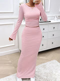 Bella Devine striped boat neck top and skirt set featuring a stylish coordinated outfit in a trendy design.