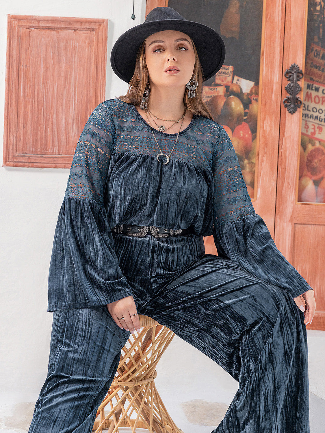 Plus size round neck flare sleeve top and pants set by BELLA, featuring a coordinated stylish outfit with a relaxed fit.