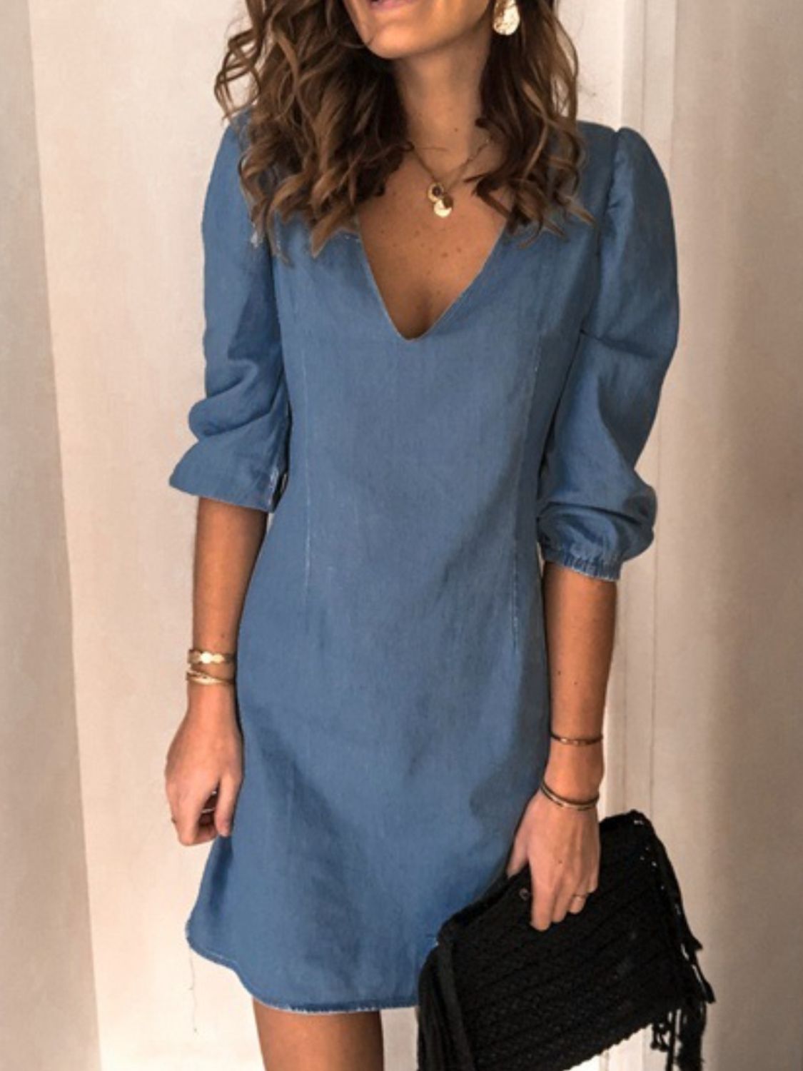 BELLA trendsi full size v-neck half sleeve dress in black, showcased on a model, casual and stylish for everyday wear.