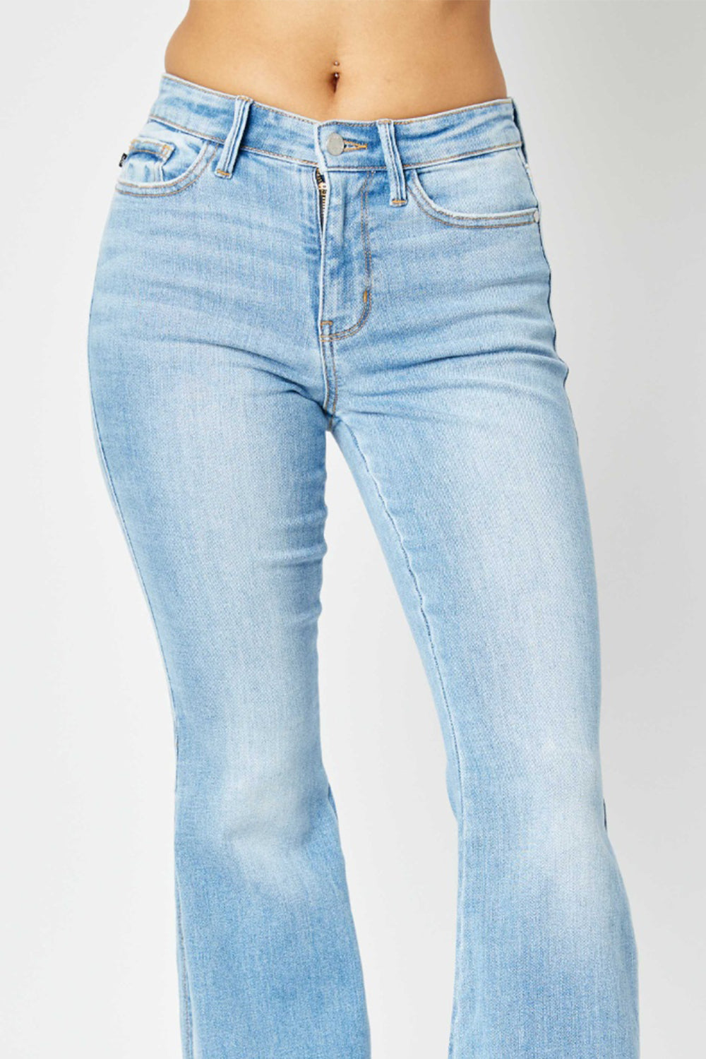 BELLA Judy Blue full size mid-rise raw hem slit flare jeans featuring trendy distressed details and a flattering fit.