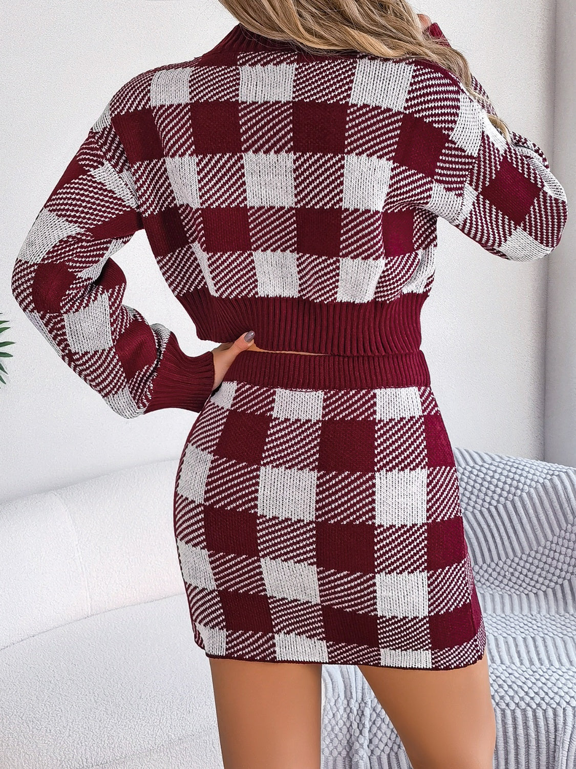 BELLA plaid round neck top and skirt sweater set from trendsi, featuring a cozy, stylish matching sweater and skirt in a plaid pattern.