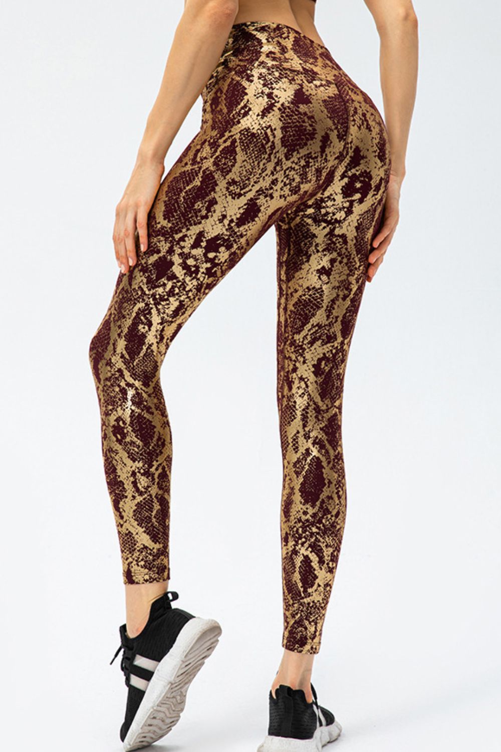 BELLA Print Sports Pants from Trendsi featuring vibrant patterns, comfortable fit, and athletic style for active wear.