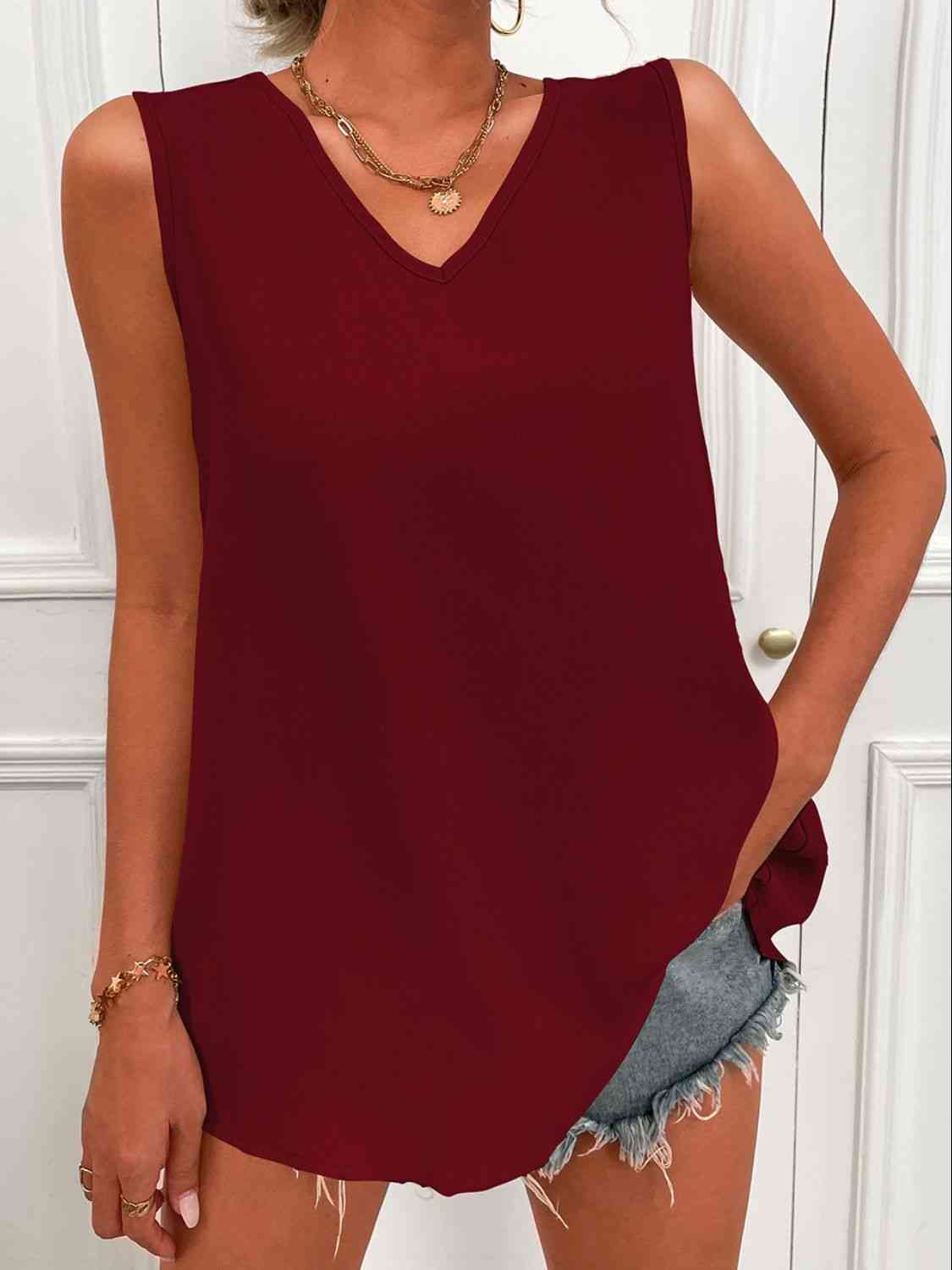BELLA V-neck curved hem tunic tank in soft fabric, featuring a flattering V-neck and stylish curved hem for a casual look.