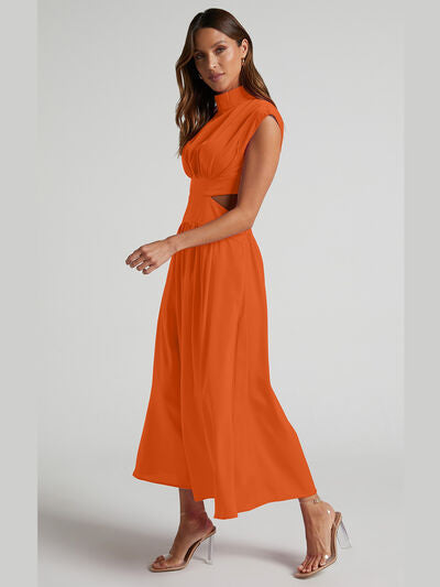 Sleeveless BELLA BLA Cutout Mock Neck Dress from Trendsi with stylish cutout details and a sleek, modern silhouette.