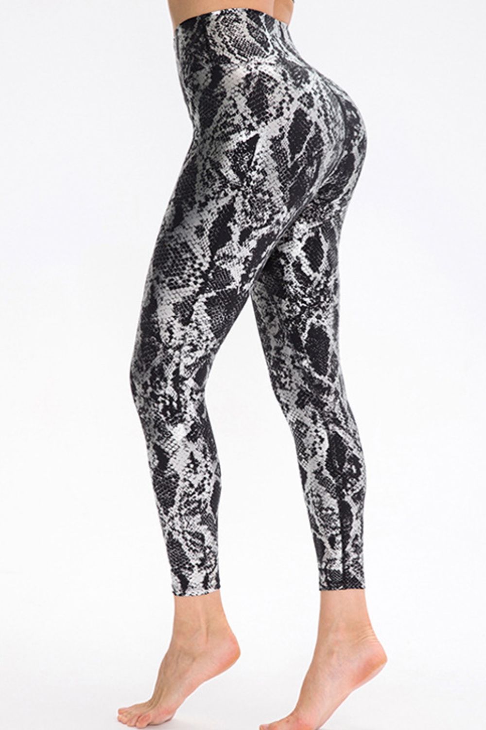 BELLA Print Sports Pants from Trendsi featuring a vibrant, patterned design and comfortable fit, ideal for active wear.