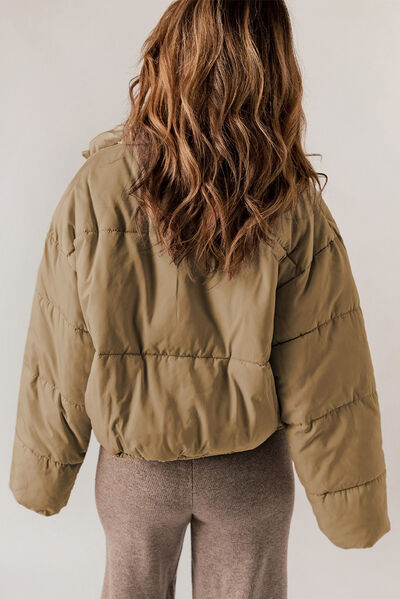 BELLA trendsi puff jacket with quilted design, high collar, and front zipper, perfect for cold weather and casual wear.