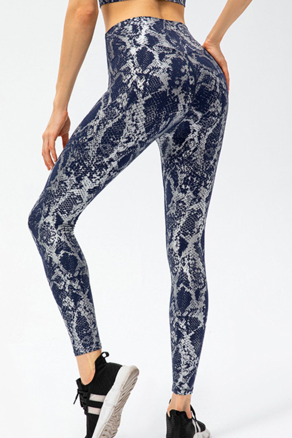 BELLA Print Sports Pants from Trendsi featuring bold patterns and comfortable fit, perfect for activewear and casual outfits.
