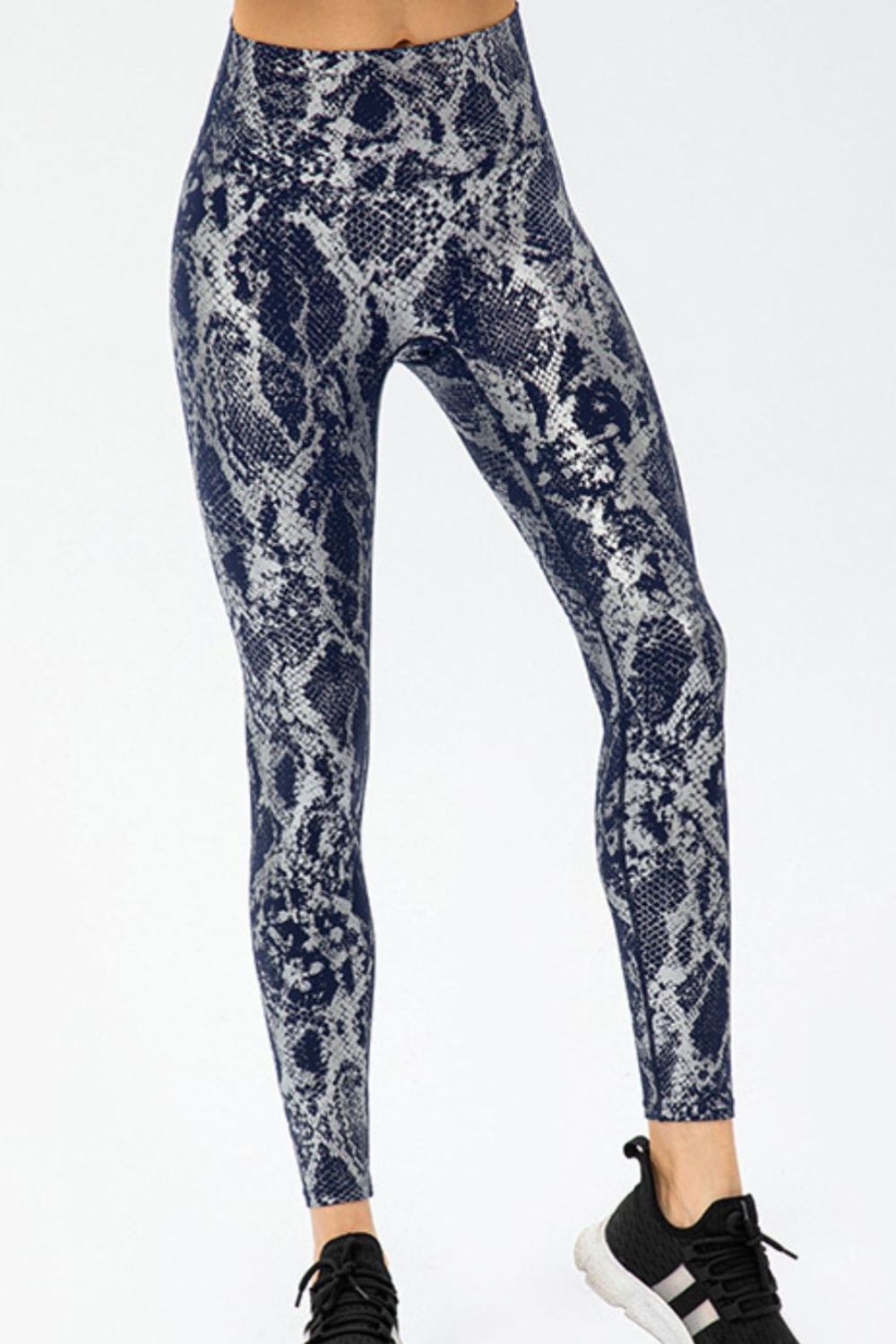 Bella Print Sports Pants from trendsi featuring bold patterns and a comfortable fit, ideal for activewear or casual outfits.
