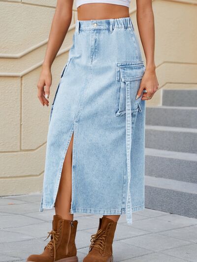 BELLA high waist denim skirt with slit pockets, featuring a stylish fit and classic blue denim fabric.