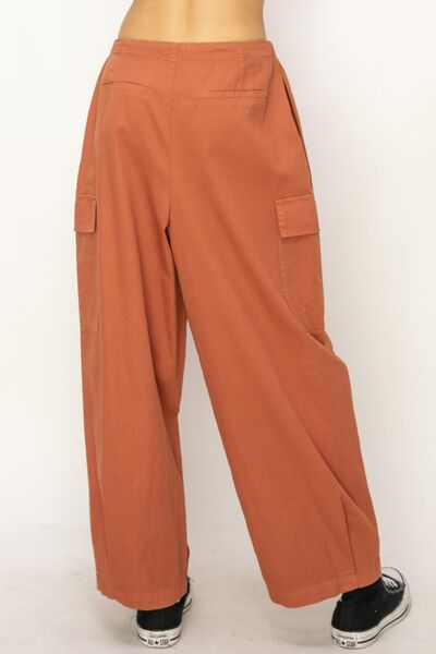 BELLA drawstring cargo wide-leg pants from Trendsi featuring a relaxed fit and multiple pockets, shown in a natural pose.