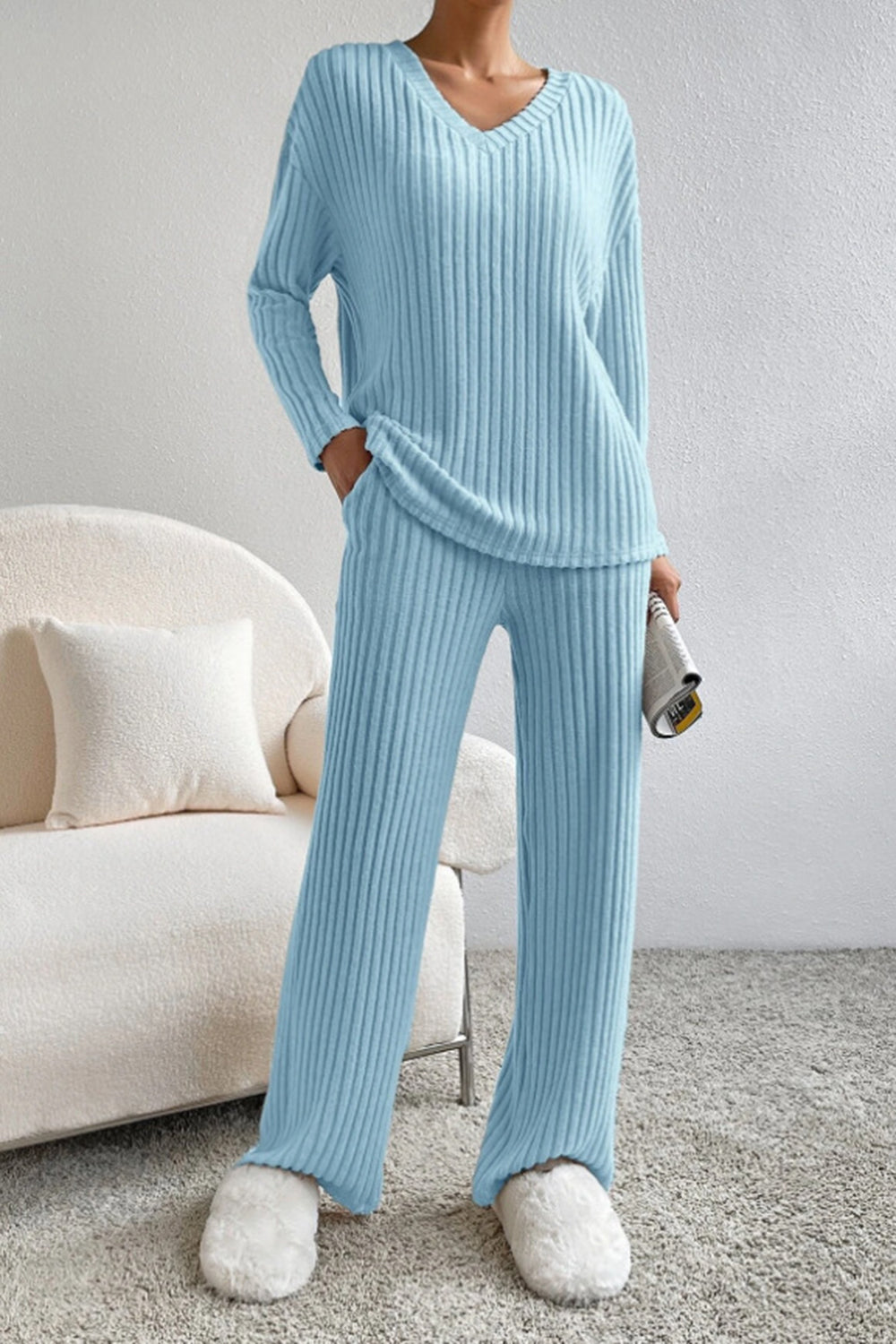 Ribbed V-neck top and matching pants set from BELLA BLA, featuring a fitted design and ribbed fabric for a stylish look.
