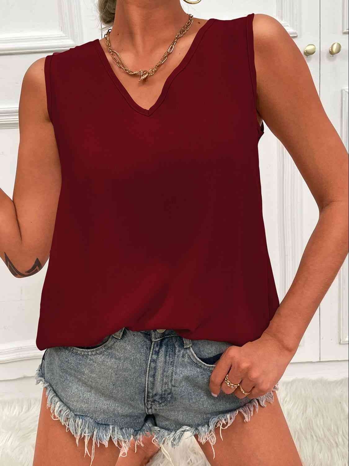 BELLA V-neck curved hem tunic tank featuring a relaxed fit and stylish design, perfect for casual or layered looks.