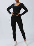 BELLA twisted backless long sleeve jumpsuit from trendsi, featuring a fitted silhouette and stylish open back design.