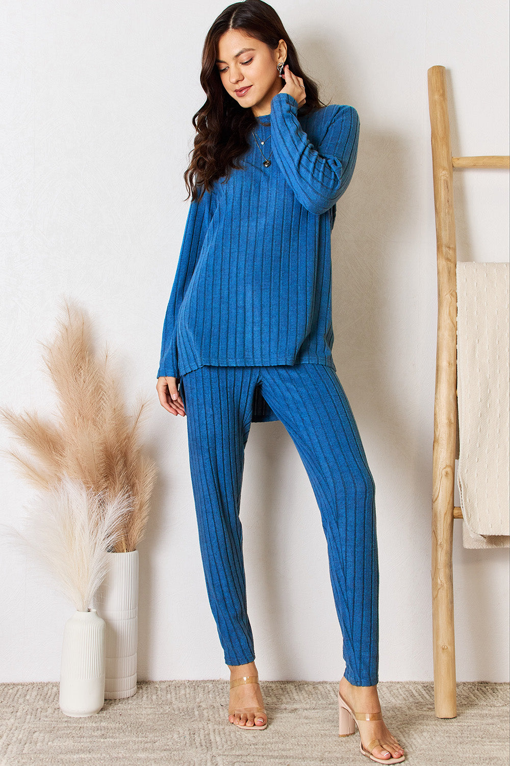 Trendsi BELLA BLA high-low slit top and matching pants set, featuring a stylish flowy design and modern silhouette.