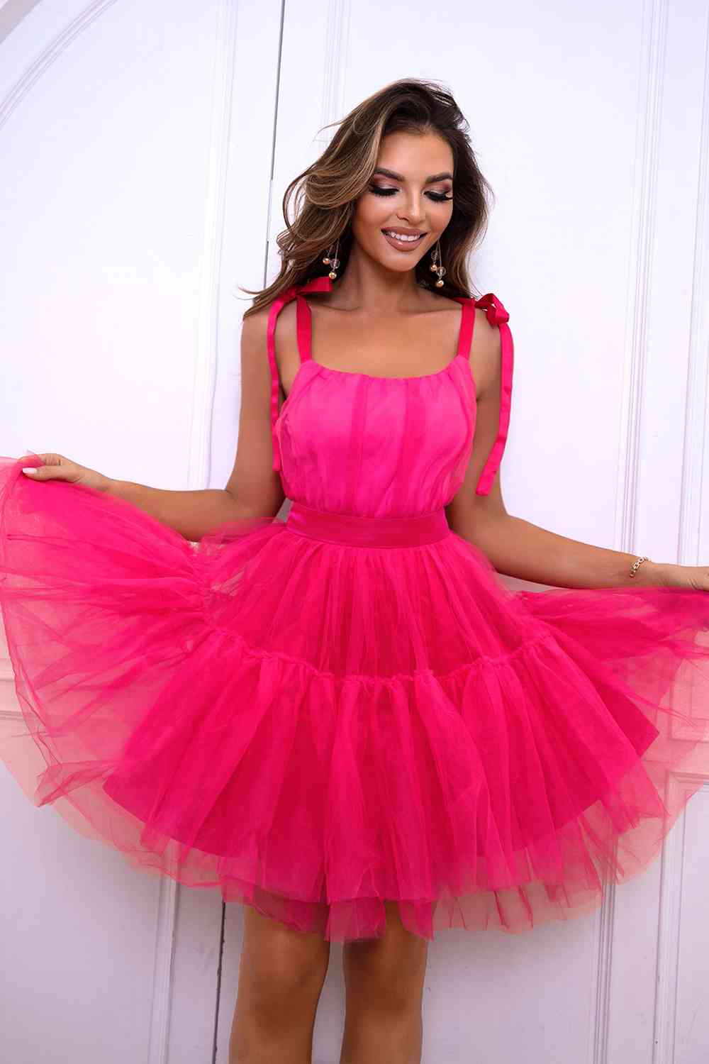 BELLA Zopi tie-shoulder mesh dress with ruffled sleeves and sheer fabric, elegant and stylish for special occasions.