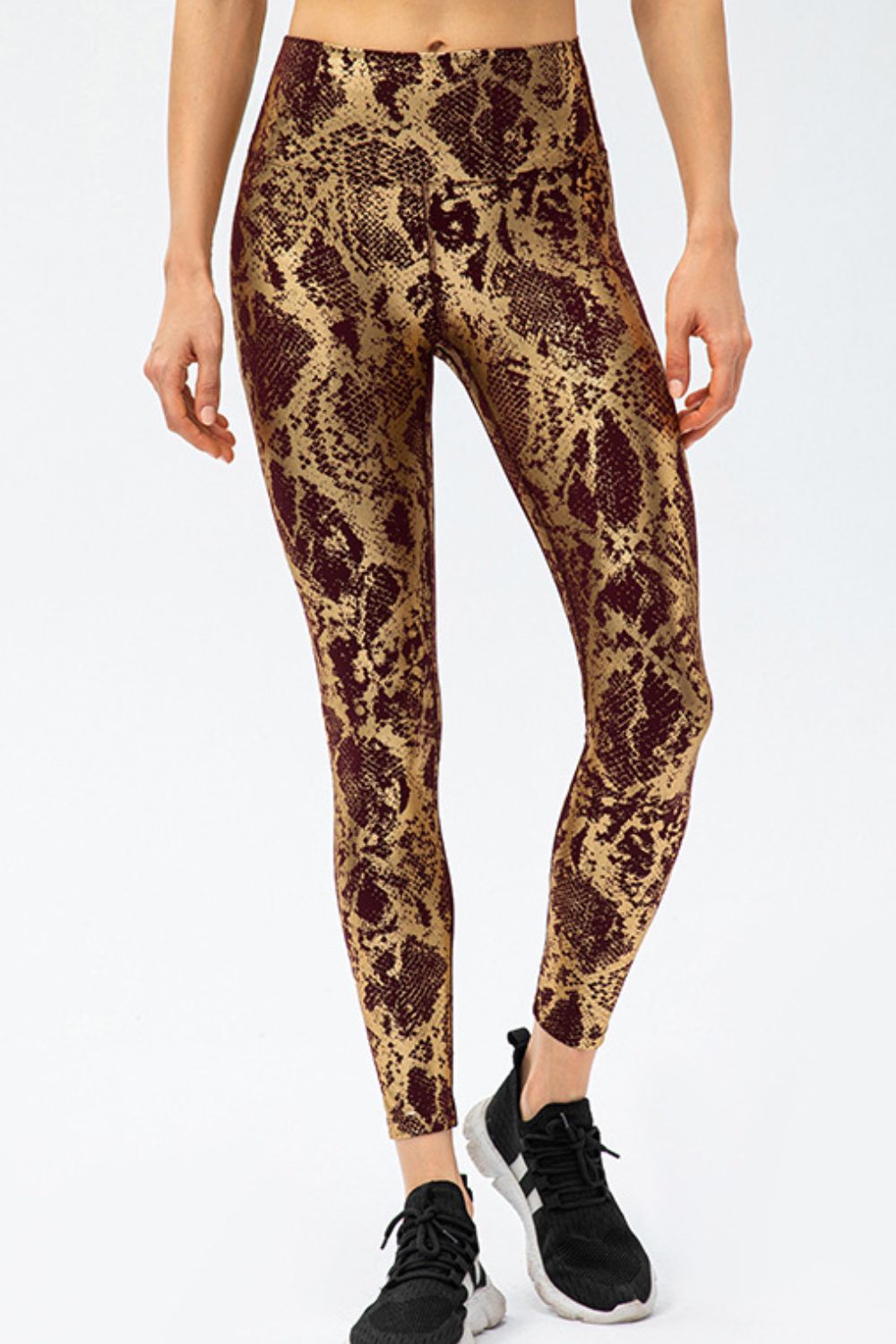 Bella Print Sports Pants from Trendsi featuring bold print design and comfortable athletic fit for activewear.