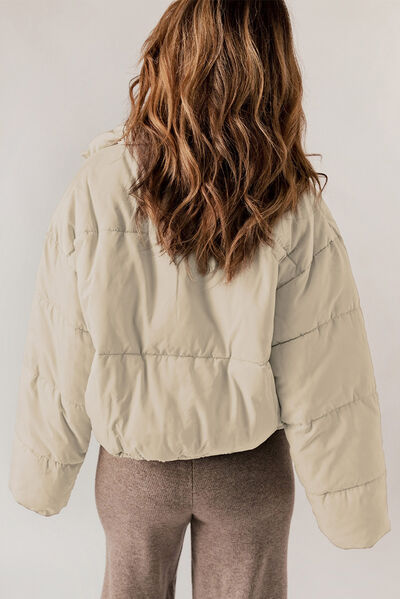 BELLA trendsi puff jacket with quilted design, lightweight padding, and stand-up collar, perfect for cold weather.
