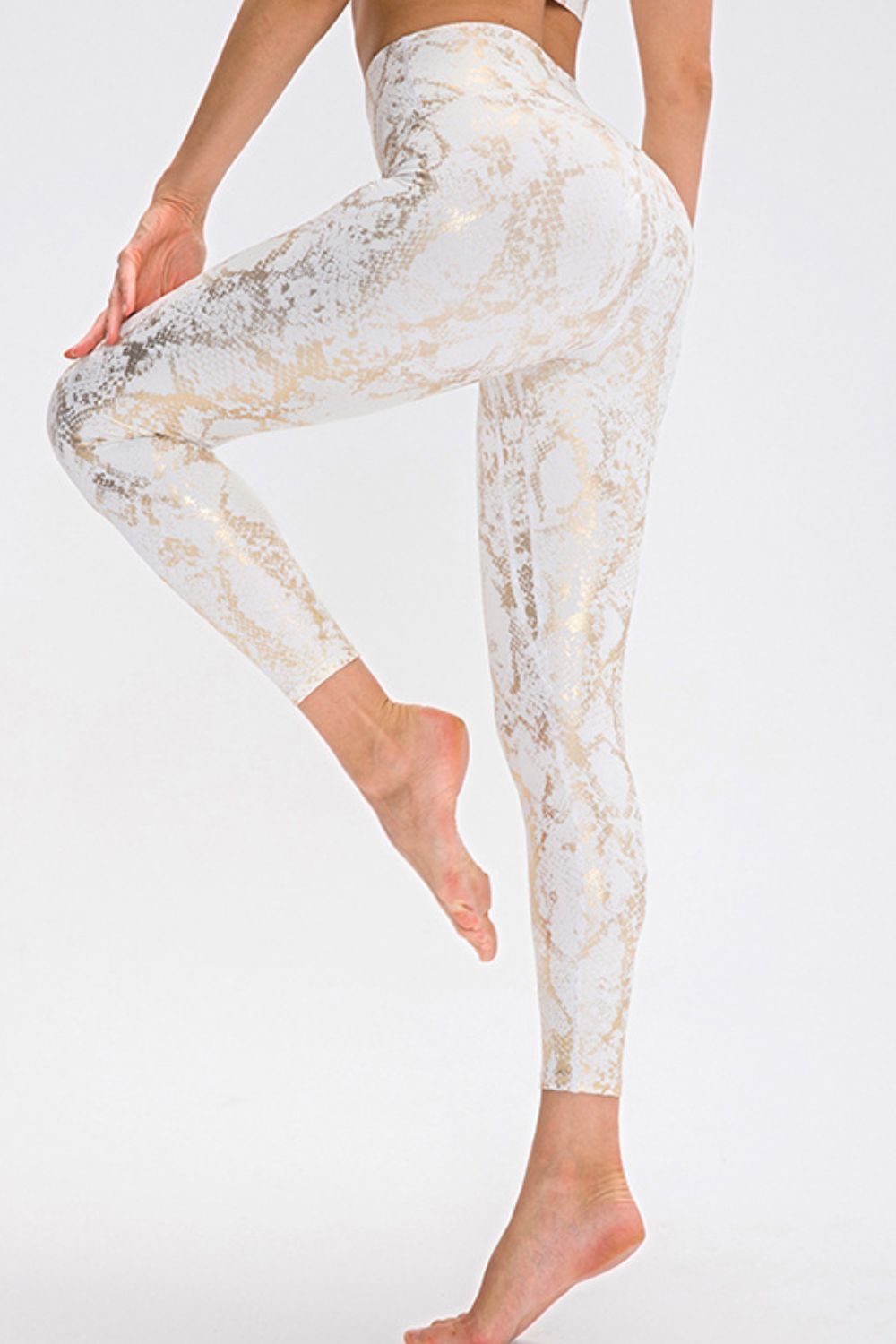 Bella Print Sports Pants from trendsi featuring stylish athletic wear with bold print and comfortable fit.