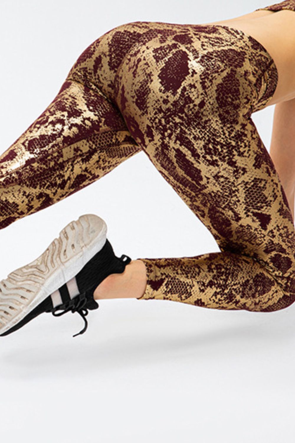 BELLA Print Sports Pants from Trendsi featuring bold patterns, comfortable fit, and athletic style for active wear.