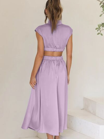 BELLA BLA Trendsi cutout mock neck sleeveless dress featuring a fitted silhouette and stylish design, shown on a model.